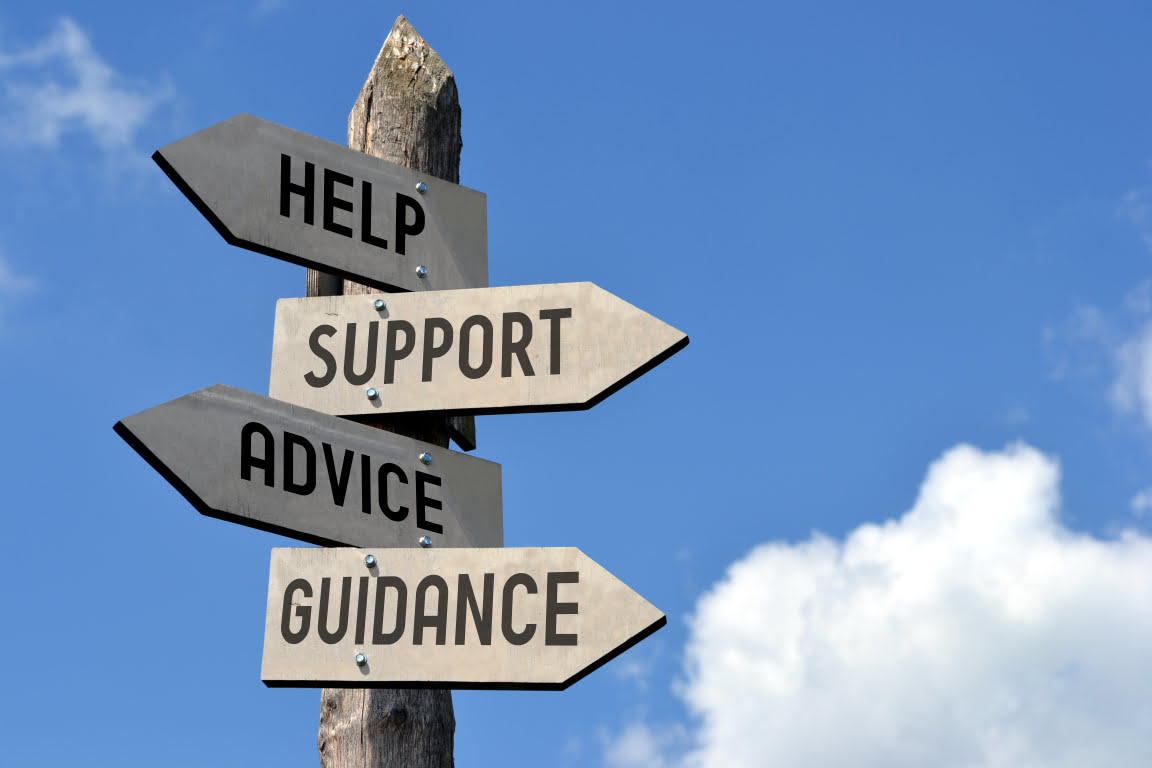 sign that says "help, support, advice, guidance"
